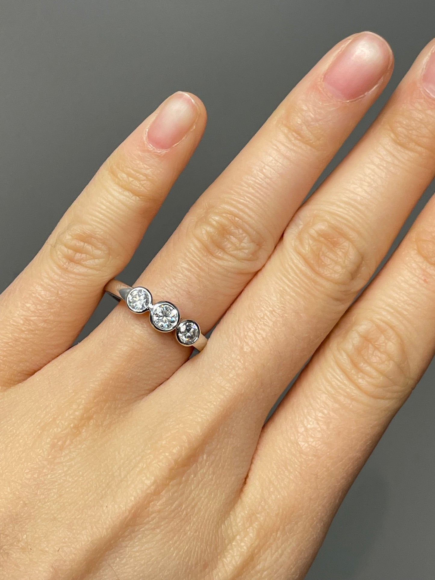 18K White Gold 0.60 CTW Diamond Bezel Trilogy Ring