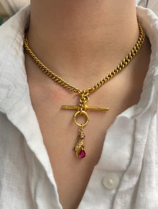 Antique 18K Gold Figural Hand with Ruby Diamond Pendant