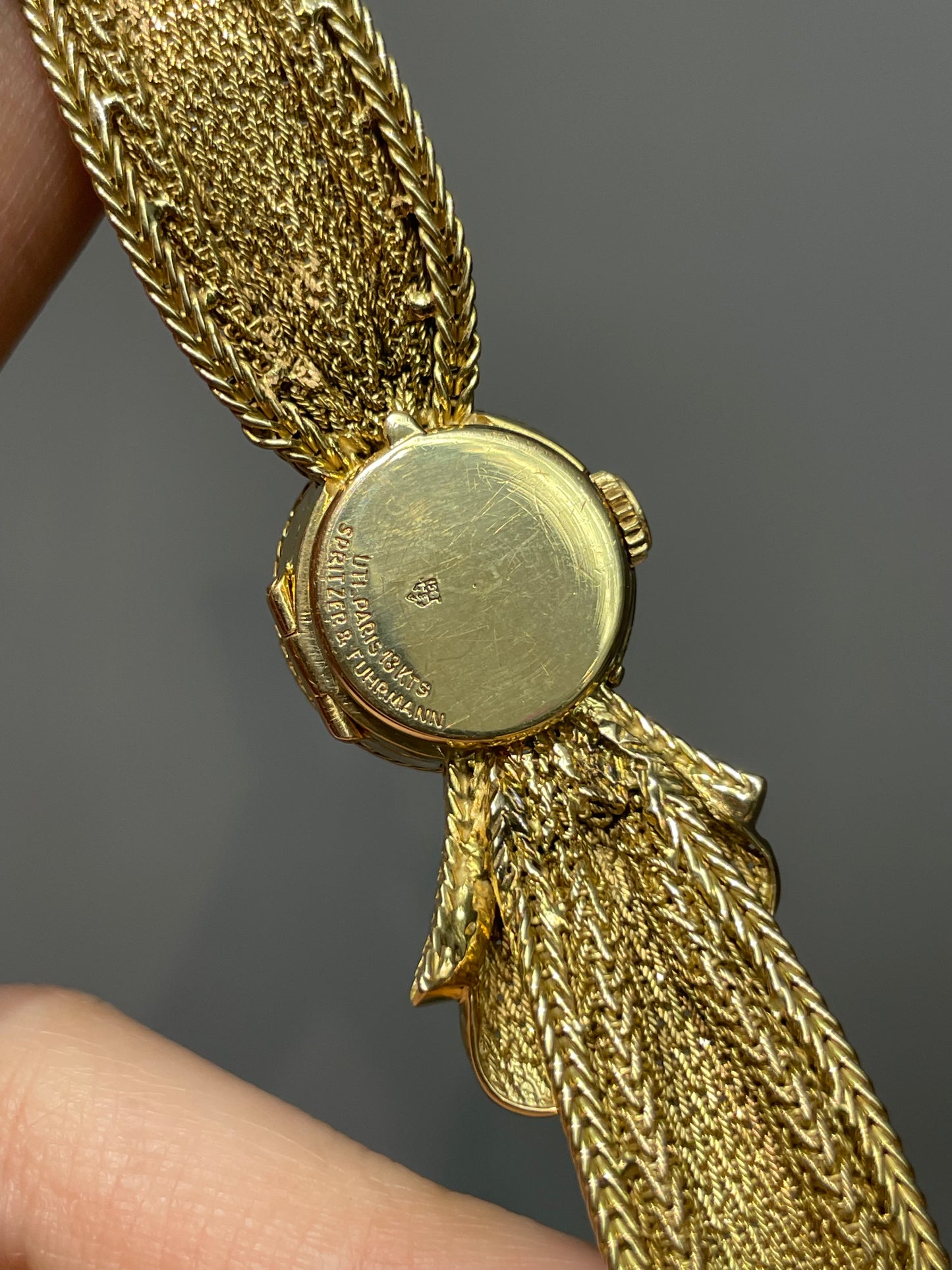 French 14K Gold UTI Hidden Bow Watch 7.0 inch