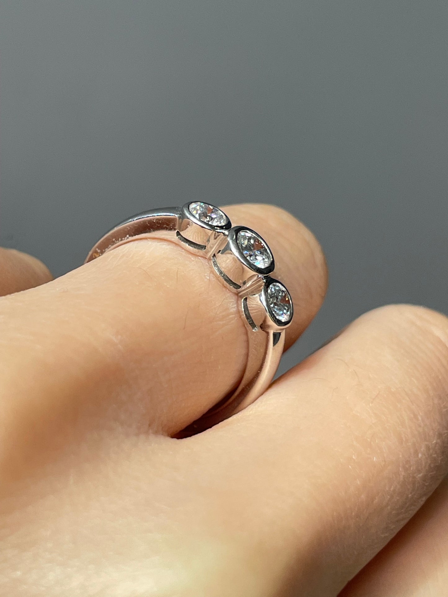 18K White Gold 0.60 CTW Diamond Bezel Trilogy Ring