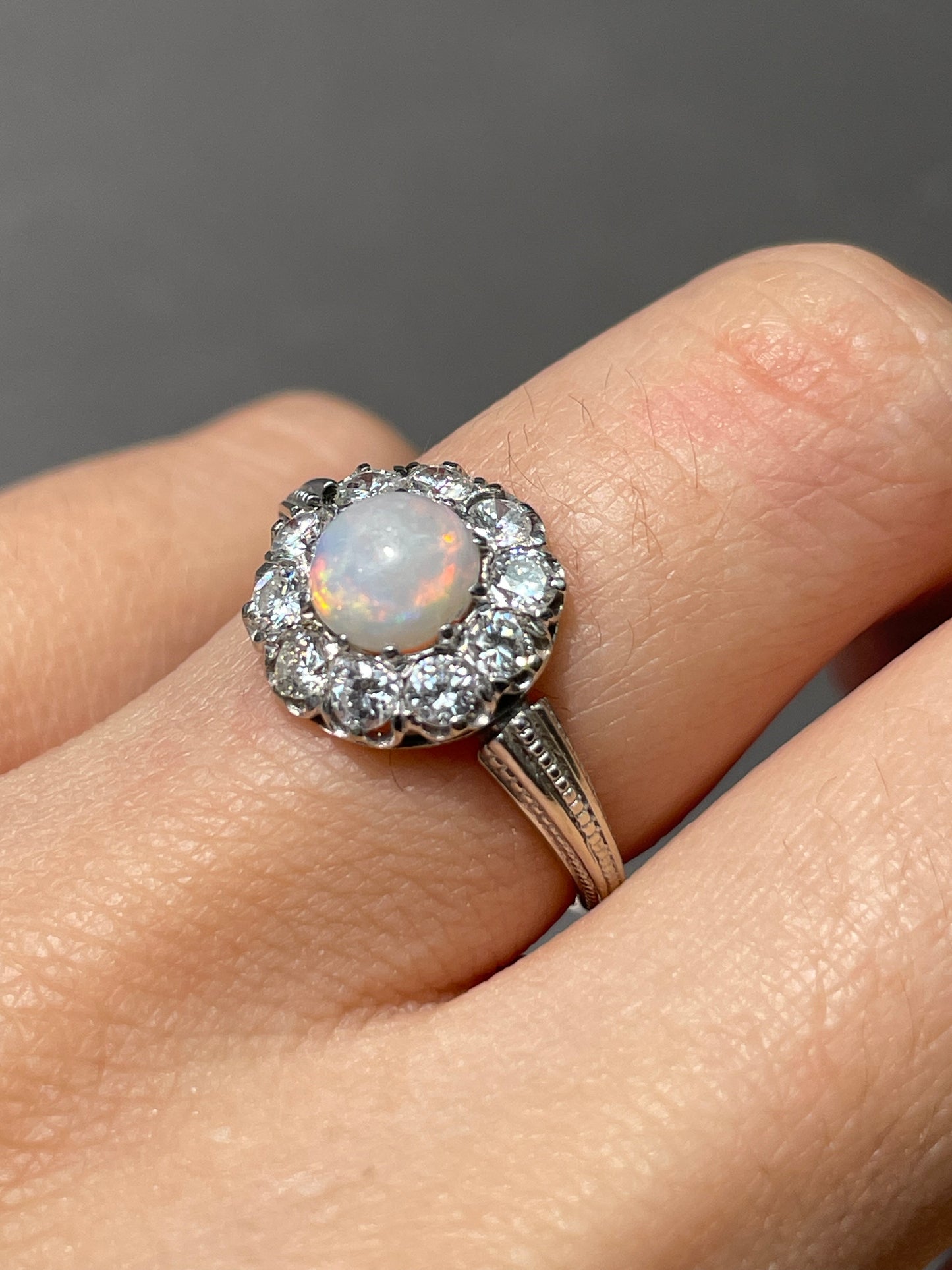 Antique French 18K White Gold Opal 0.80 CTW Diamond Halo Ring