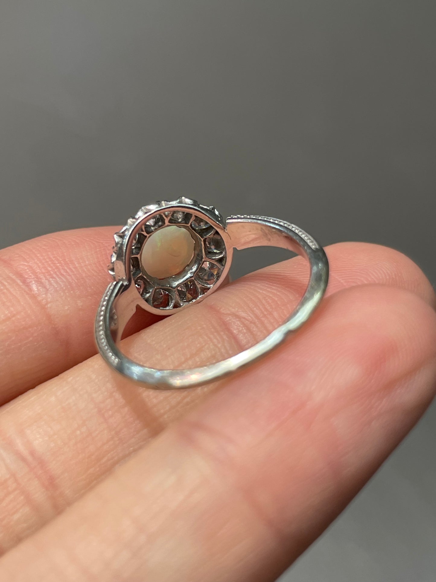 Antique French 18K White Gold Opal 0.80 CTW Diamond Halo Ring