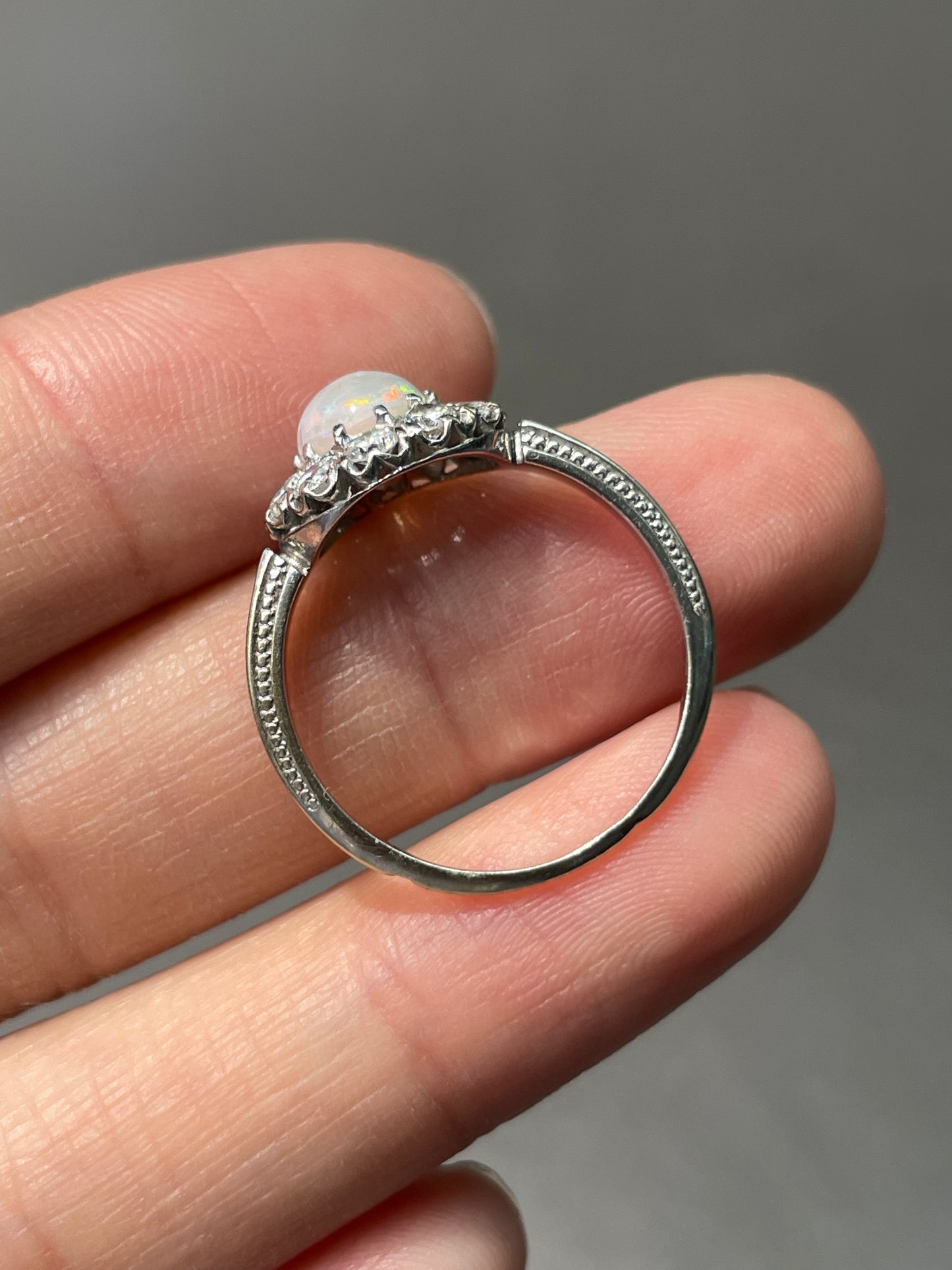 Antique French 18K White Gold Opal 0.80 CTW Diamond Halo Ring