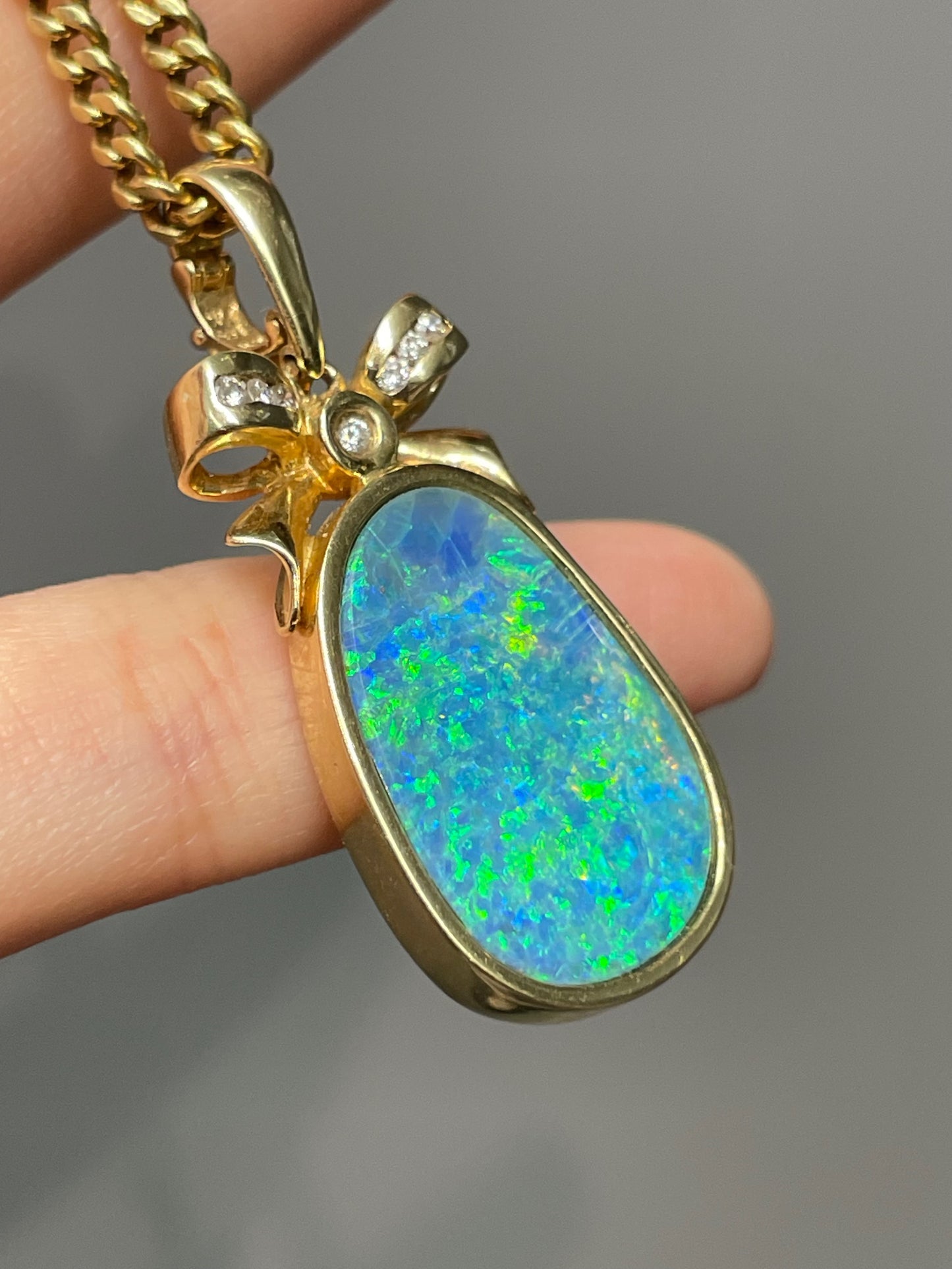Vintage 14K Yellow Gold Diamond Ribbon Opal Pendant