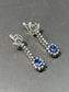 Boucle d'oreille vintage en or 18 carats avec saphir bleu et diamant