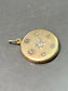 Antique 14K Gold Starburst Circle Locket