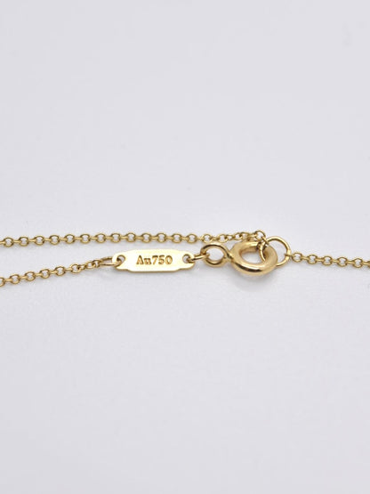 Tiffany &amp; Co. Collier T Smile en or 18 carats petit