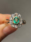 Antique Platinum Topped 14K Gold 0.51 CTW Emerald Diamond Halo Ring