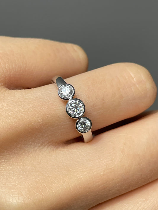 18K White Gold 0.60 CTW Diamond Bezel Trilogy Ring