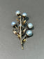 ￼Broche vintage en forme de fleur de perle en or 14 carats