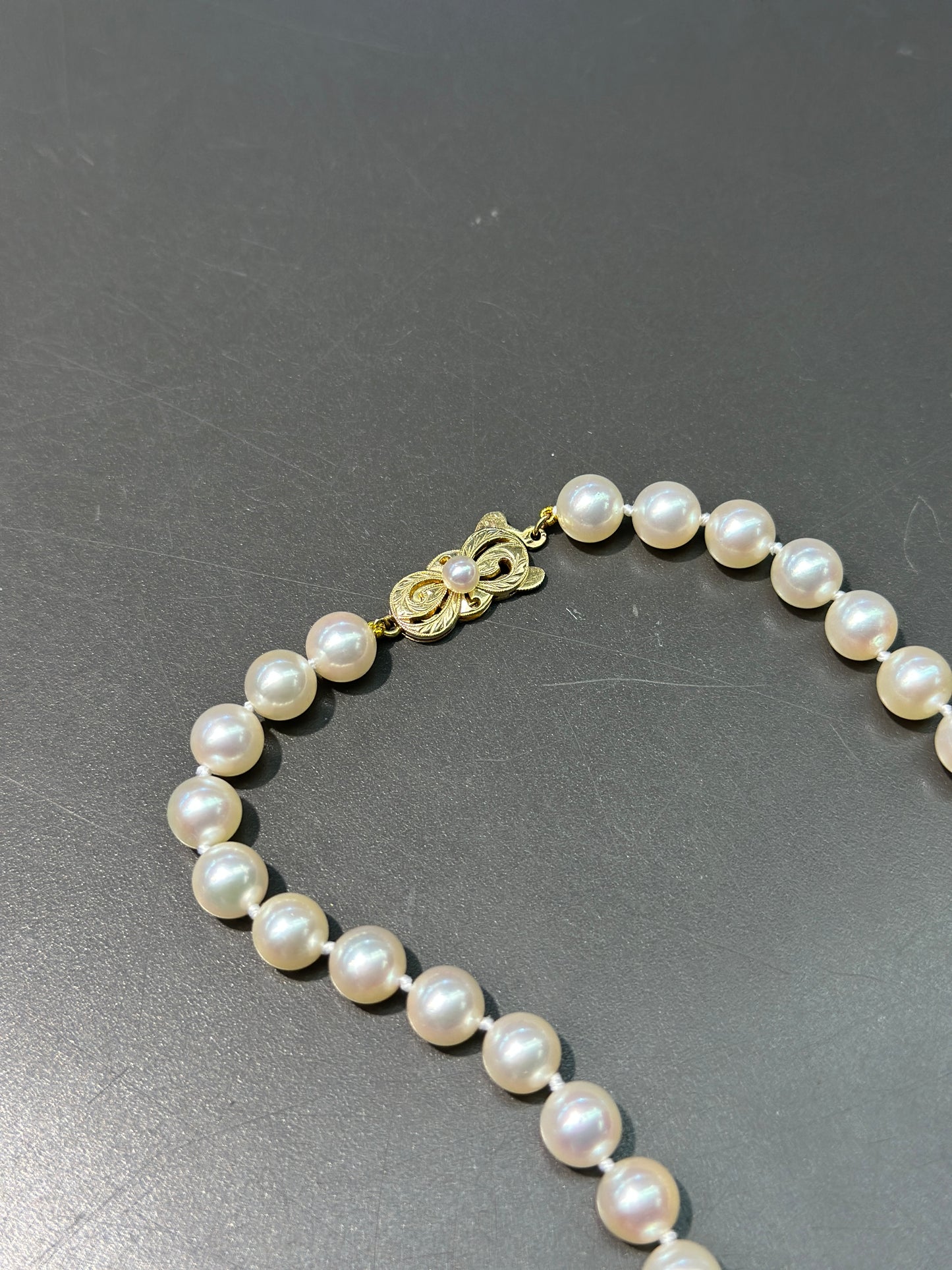 Collier de perles de culture Mikimoto en or 14 carats de 7,0 mm