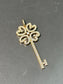 Tiffany & Co. 18K Gold Rose Gold Enchant Diamond Key Pendan