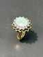 Bague vintage en or 14 carats avec opale et halo de diamants