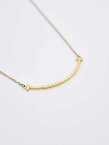 Tiffany &amp; Co. Collier T Smile en or 18 carats petit