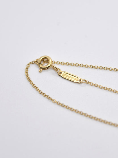 Tiffany &amp; Co. Collier T Smile en or 18 carats petit
