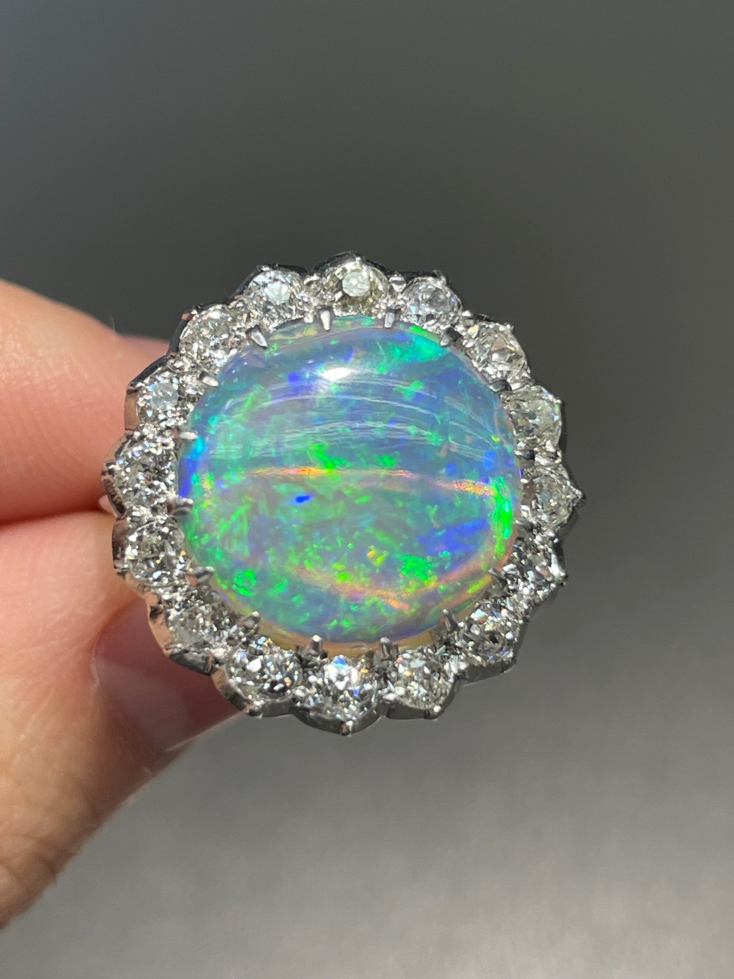 Antique Platinum Opal 1.28ct Diamond Halo Ring