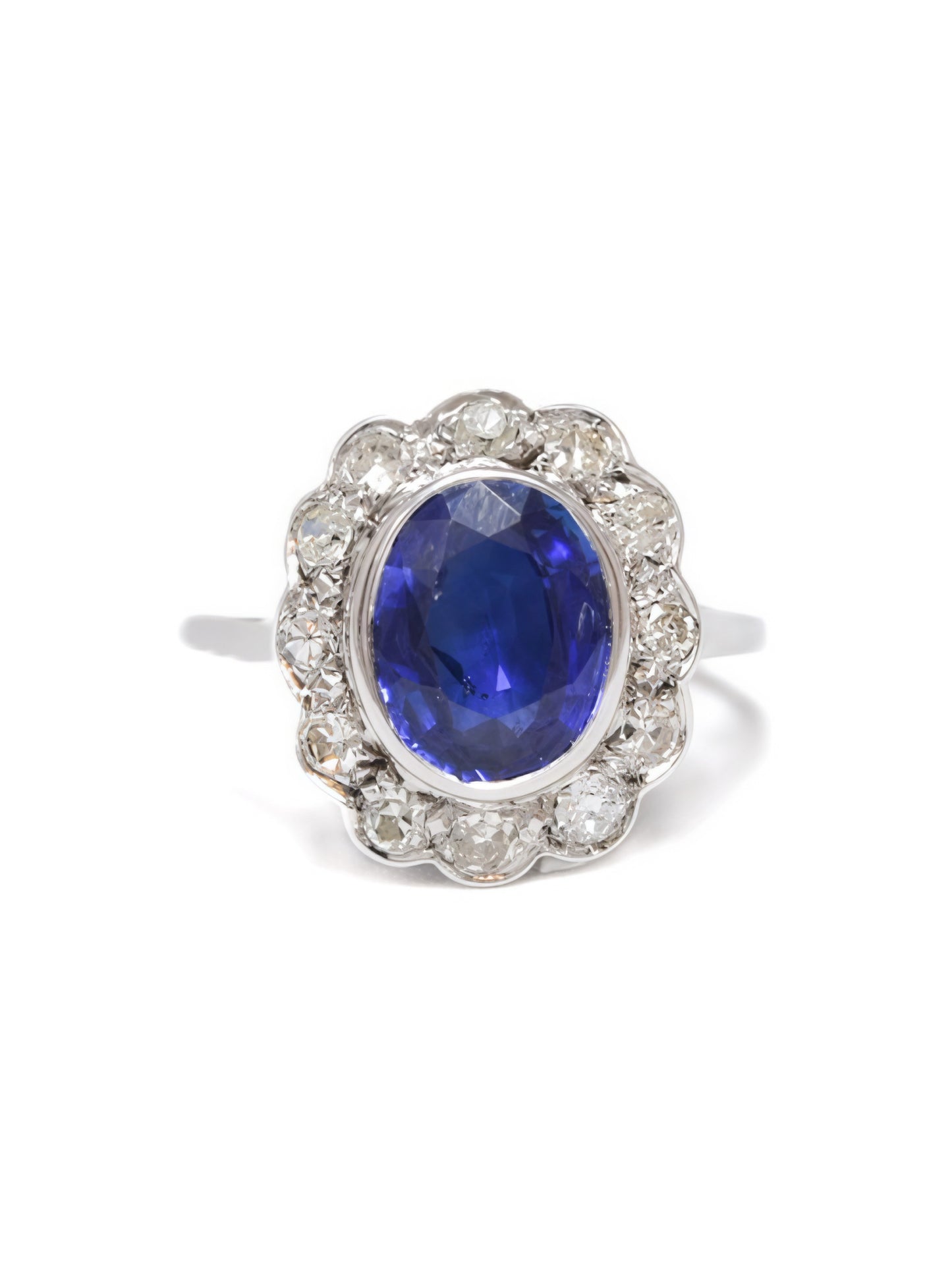 Edwardian Platinum 1.73 CTW Heated Ceylon Sapphire Diamond Halo Ring
