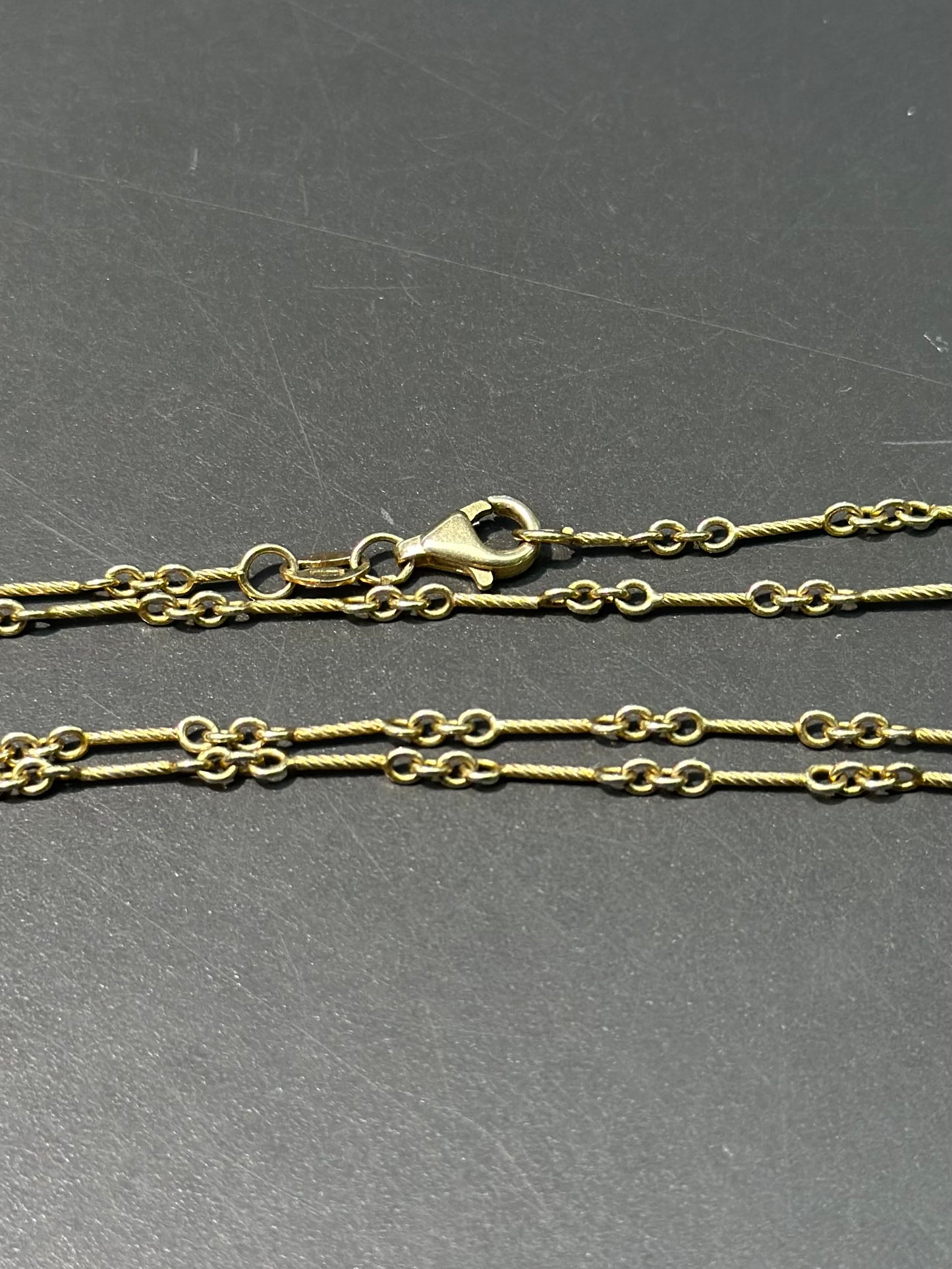 Collier chaîne en corde torsadée en or 14 carats