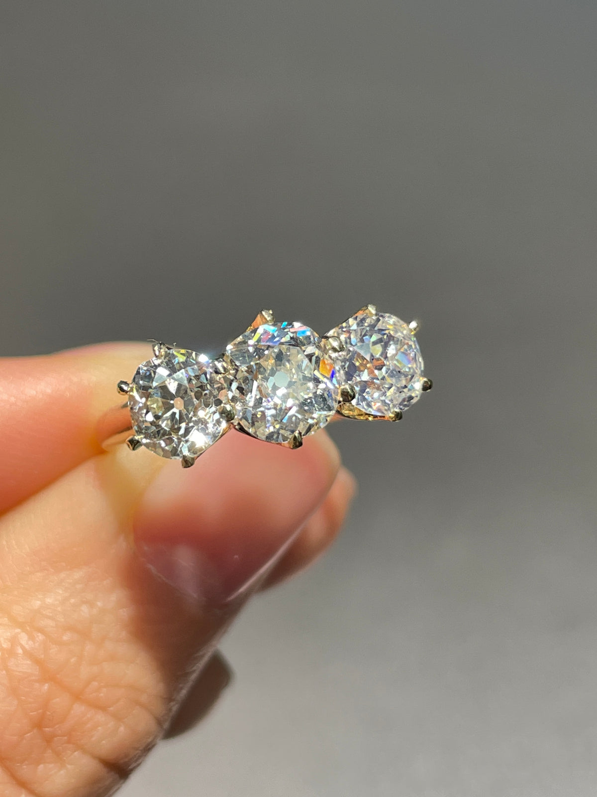 Antique 2.64 CTW Old Mine Cut Diamond Trilogy Ring GIA