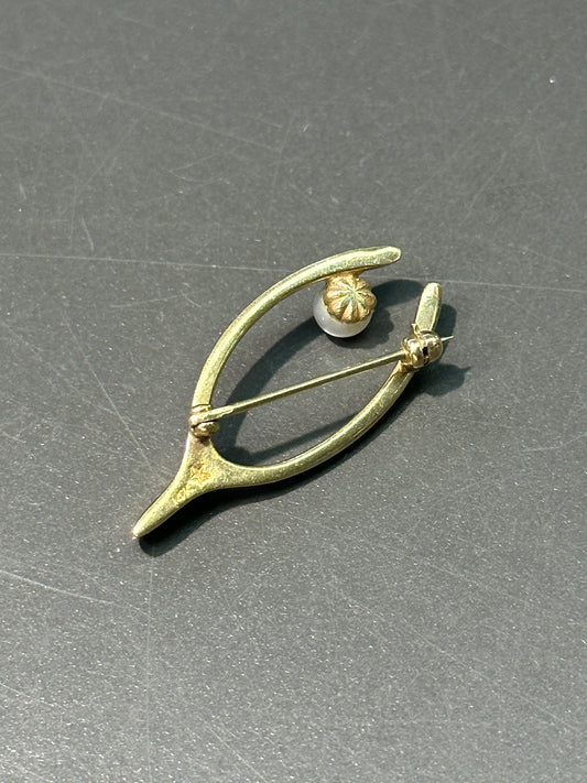 broche vintage en forme de wishbone en perles d’or 14 carats