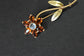 broche vintage en or 14 carats citrine et pierre de lune marguerite